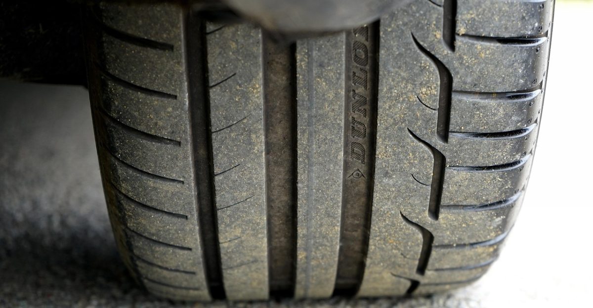 tyre car wheel tire vehicle car wallpapers automobile auto technology black automotive transport motor transportation road highway car on road asphalt dunlop gray car gray technology gray road