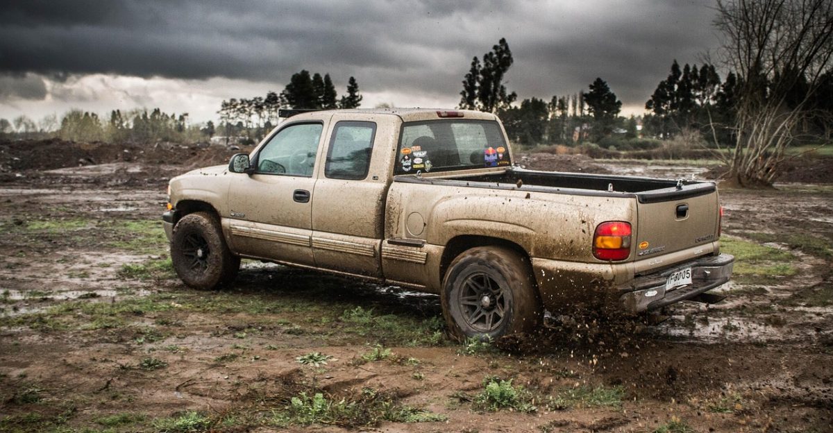 silverado 4x4 mud water herbs dirty water nature offroad