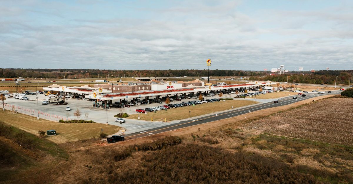 Wide aerial view of Buc-ee s gas station in Warner Robins Georgia surrounded by lush landscape