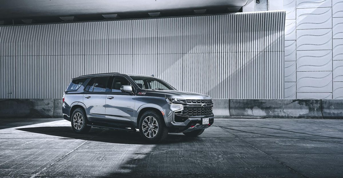 Silver SUV parked outdoors showcasing luxury and power in an urban environment