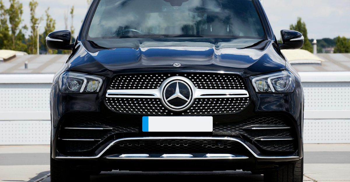Front view of a luxurious black Mercedes-Benz GLE SUV parked outdoors