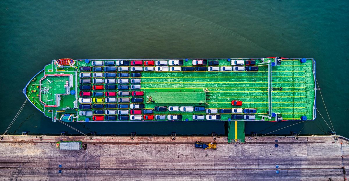Aerial view of a car transport ship docked at Bekasi port Indonesia
