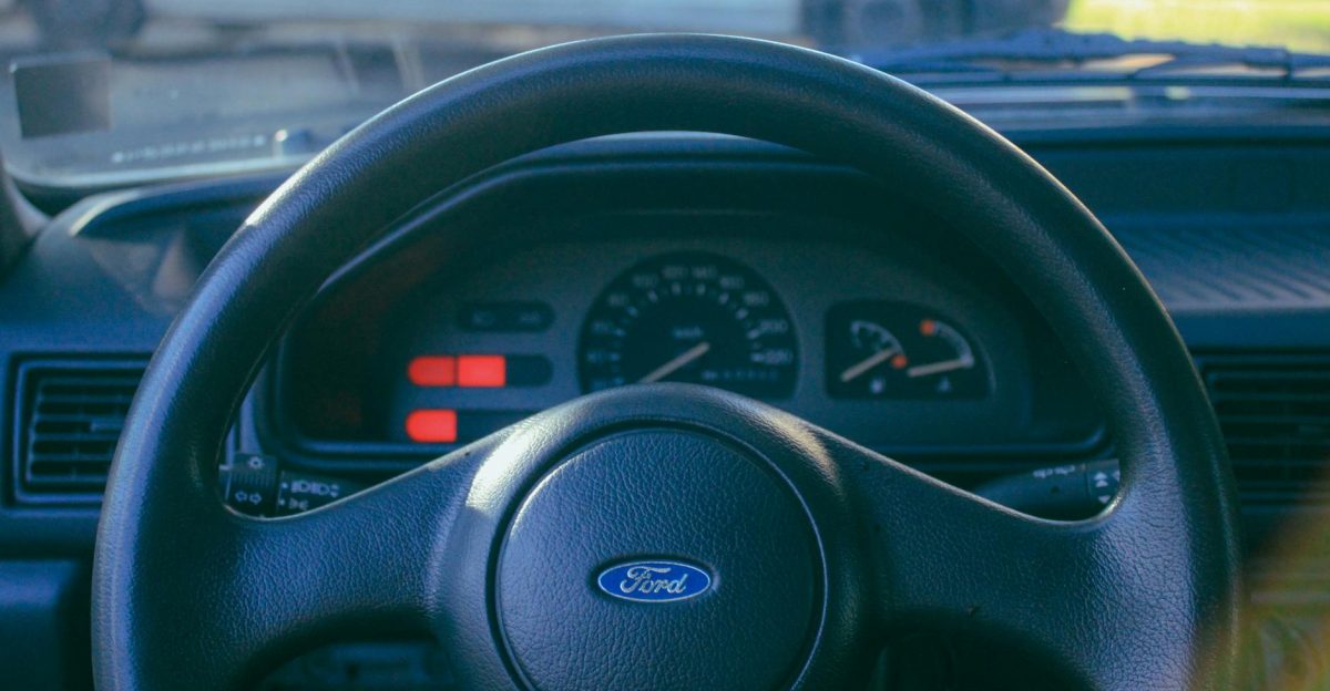 Close-up view of a classic Ford steering wheel showcasing interior details