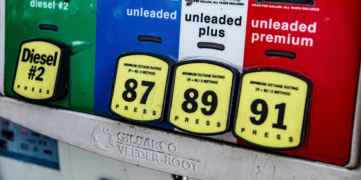 Close-up of a vintage gas pump station showing fuel prices and octane ratings in Los Angeles.