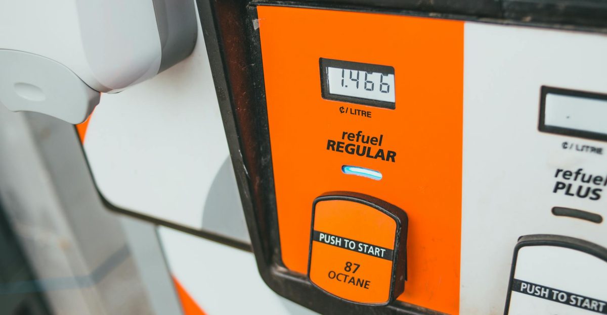 Detailed view of a gas pump showing price and octane level 87