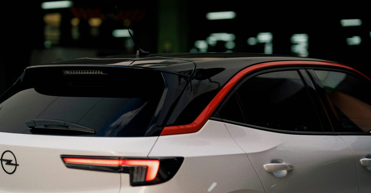 a white car parked in a parking garage