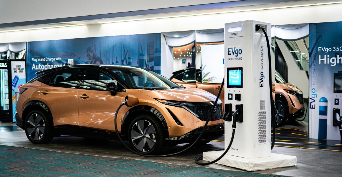 an electric car plugged into a charging station